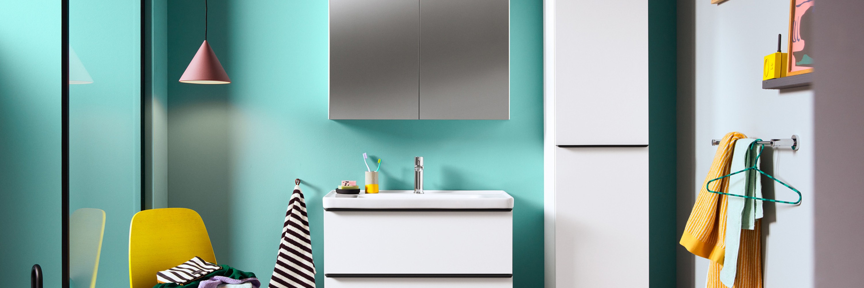 Duravit D-Neo bathroom with turquoise wall and colorful accessories