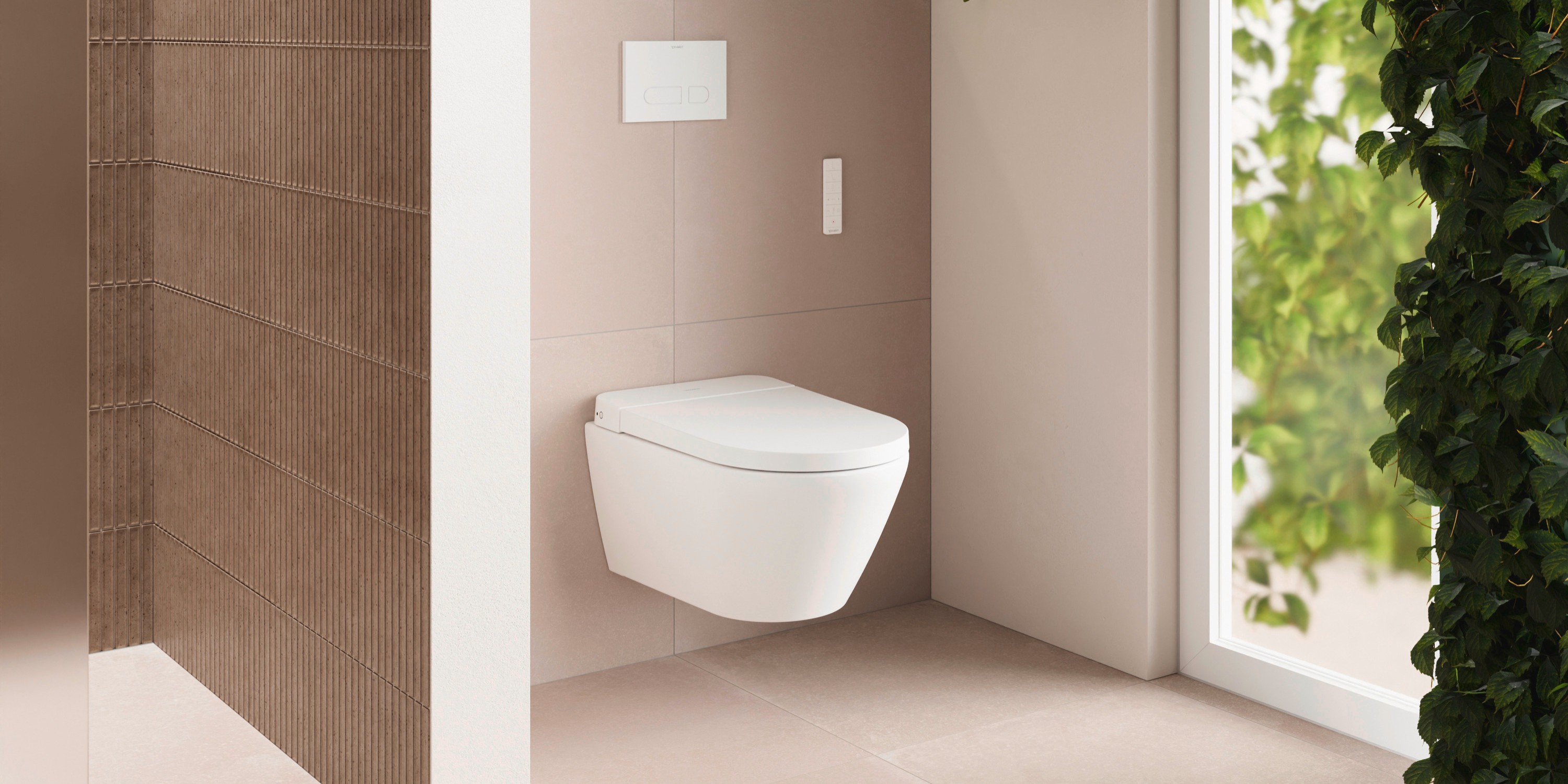 Wall-mounted toilet from the Duravit SensoWash D-Neo series in front of bathroom plants