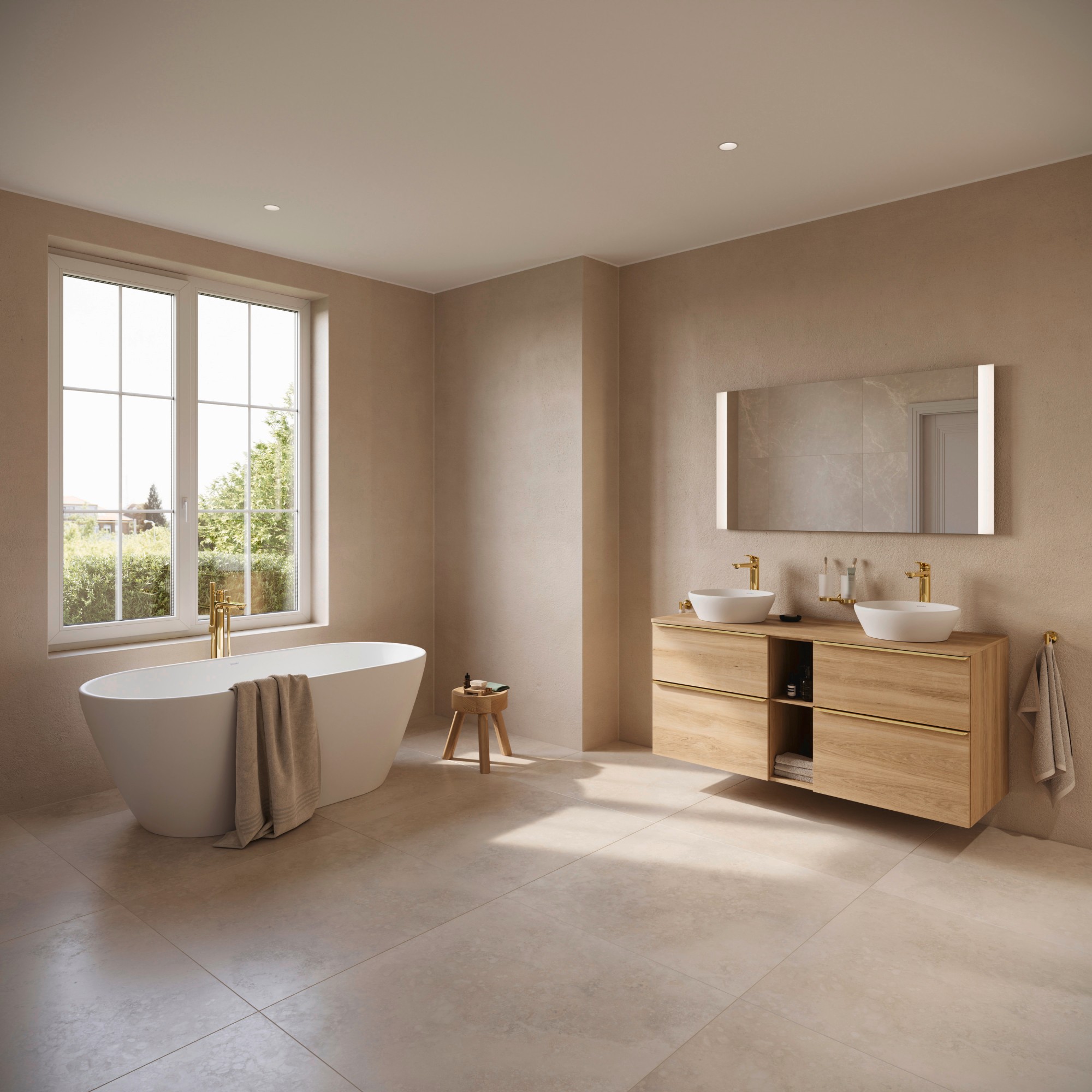 Badarmaturen und Accessoires von verschiedenen Duravit Serien in Gold poliert