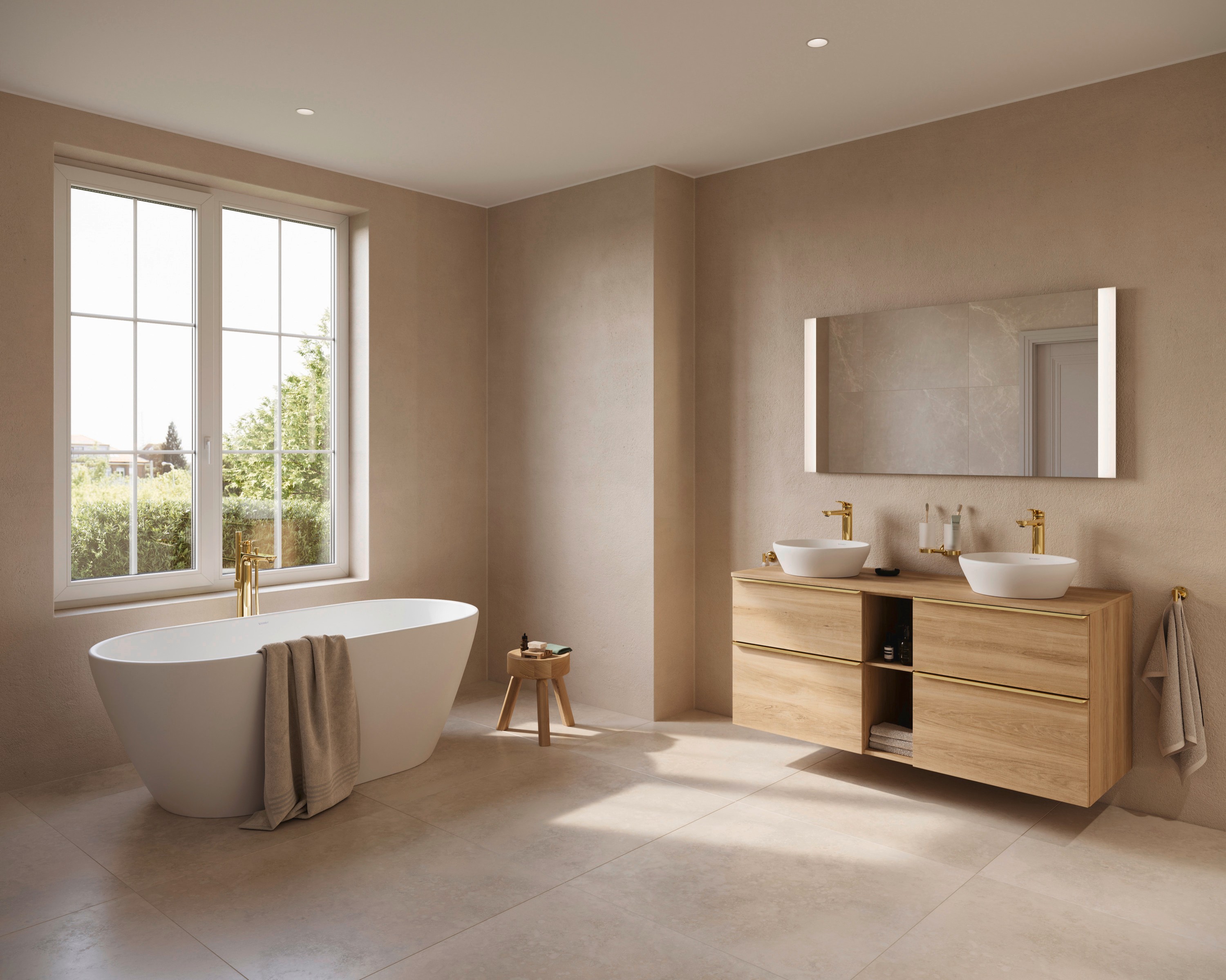 Badarmaturen und Accessoires von verschiedenen Duravit Serien in Gold poliert