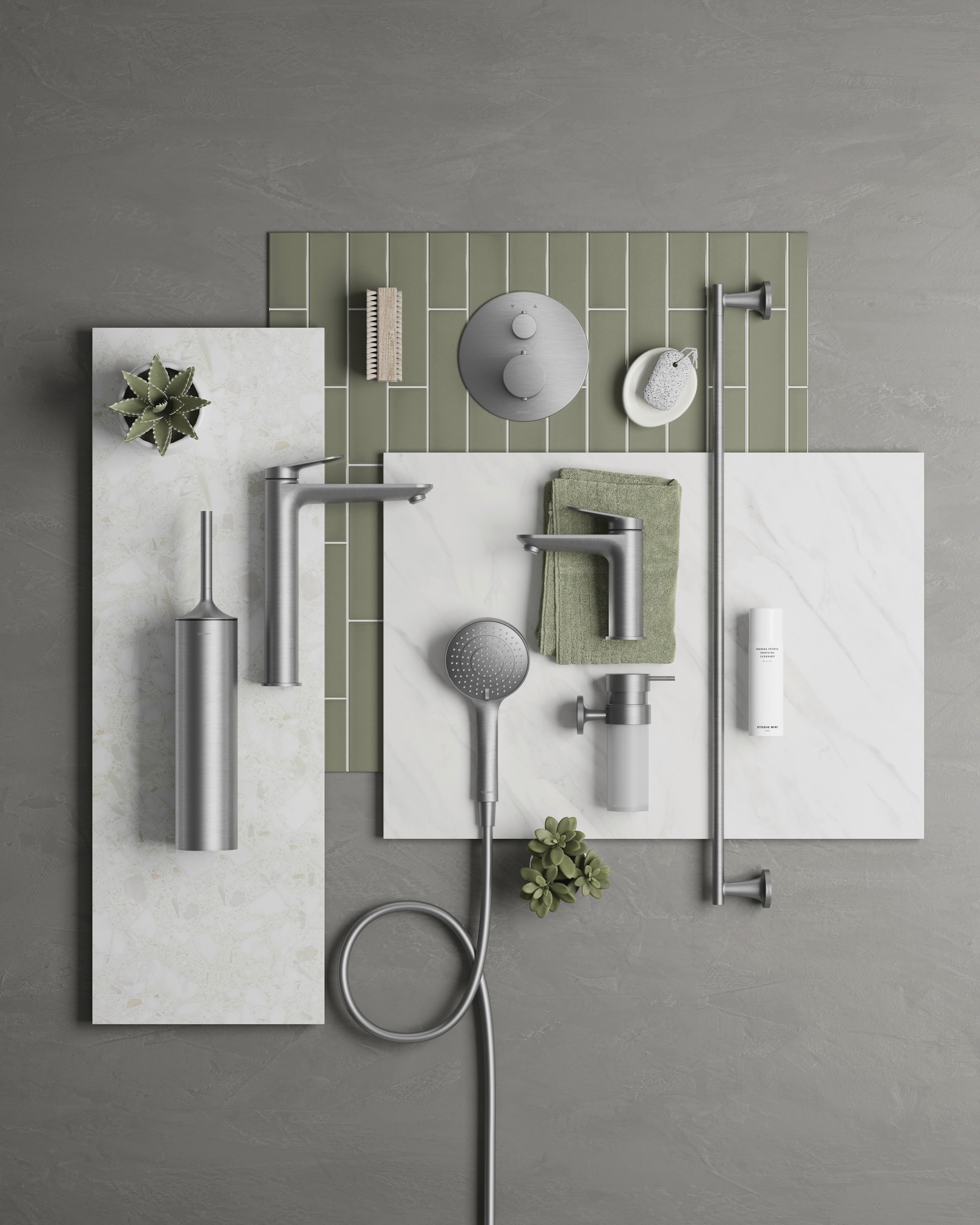 Faucets and accessories with a brushed stainless steel finish from Duravit