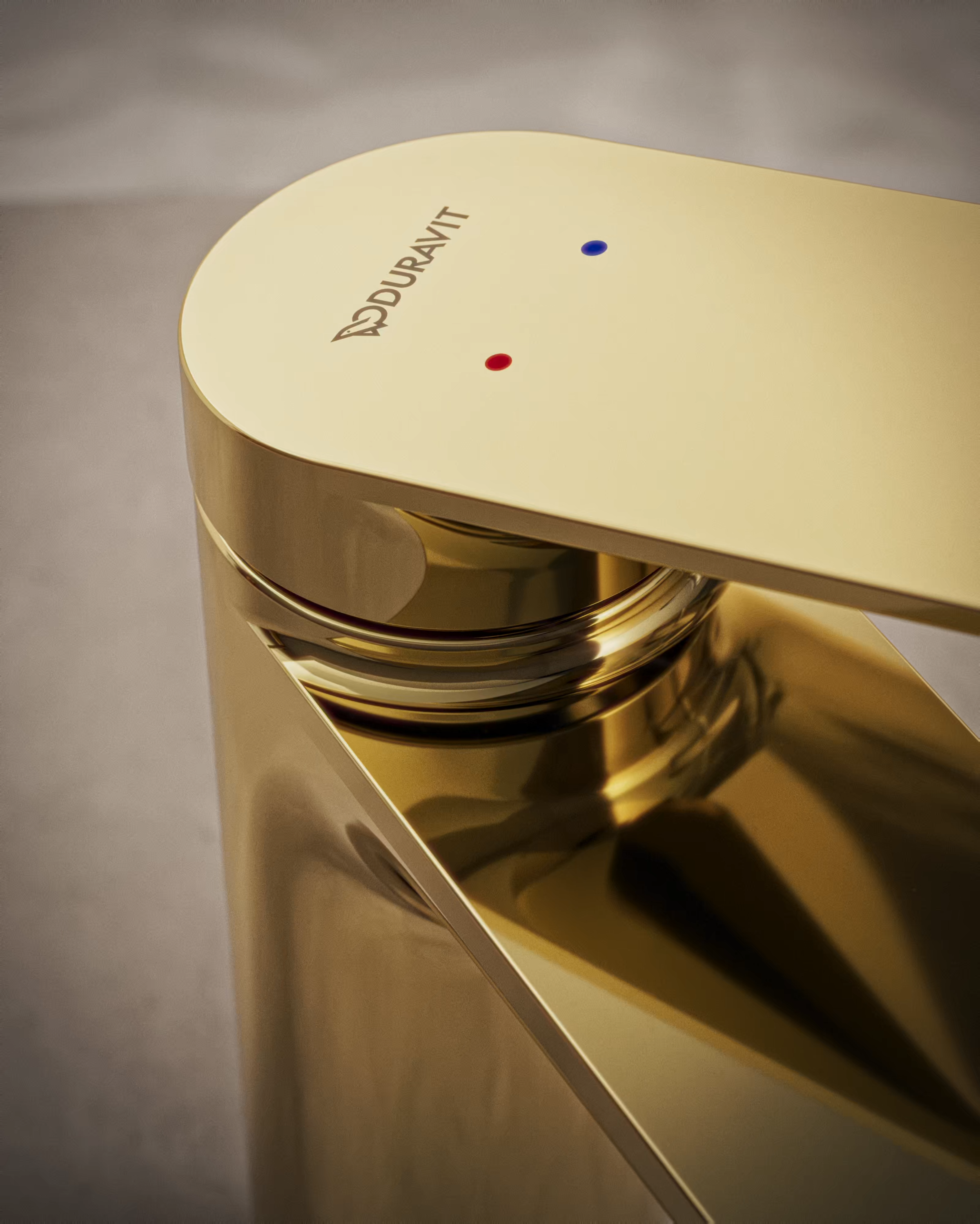 Detailed view of faucet in polished gold finish by Duravit