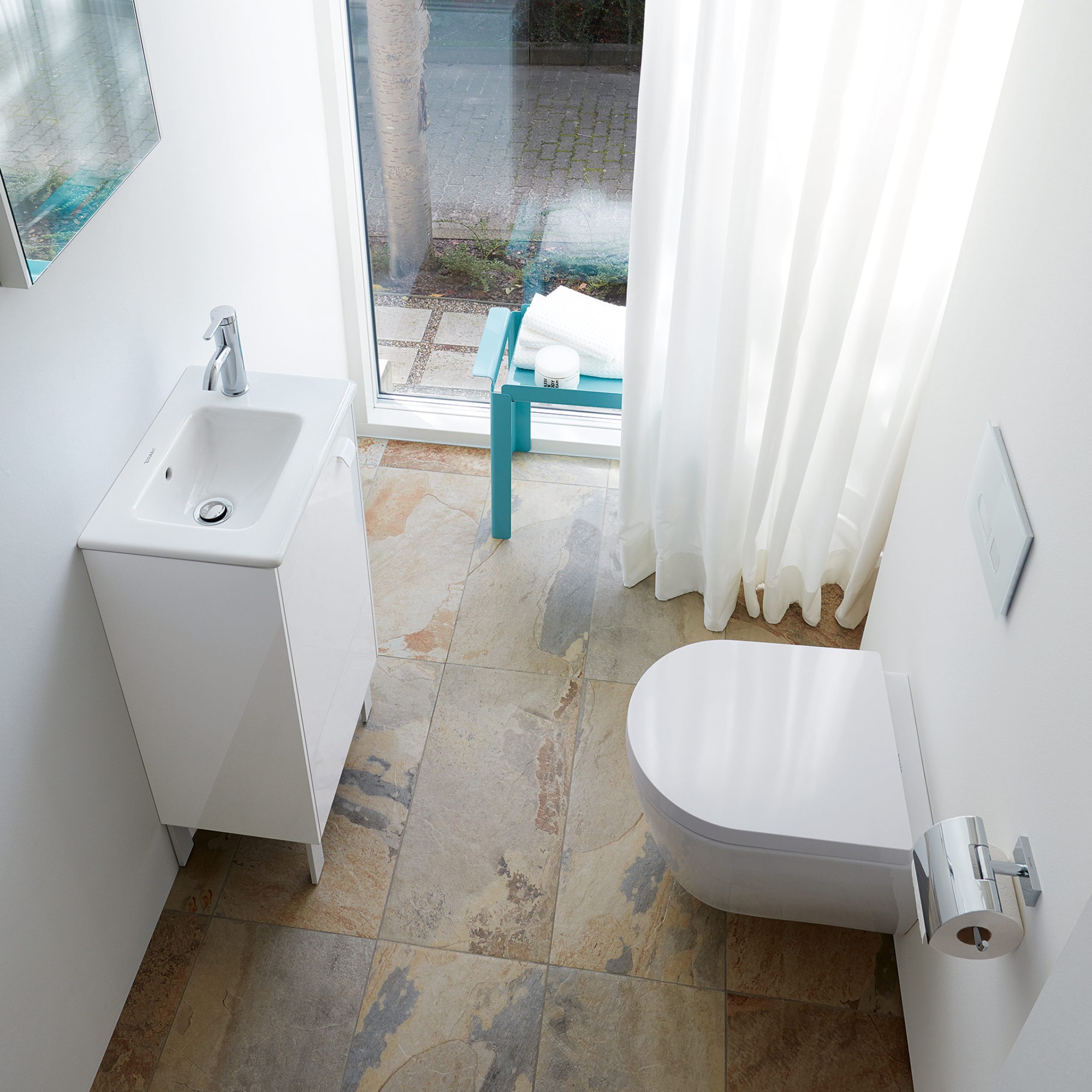 Duravit floor-standing toilet and Sink area in a small bathroom