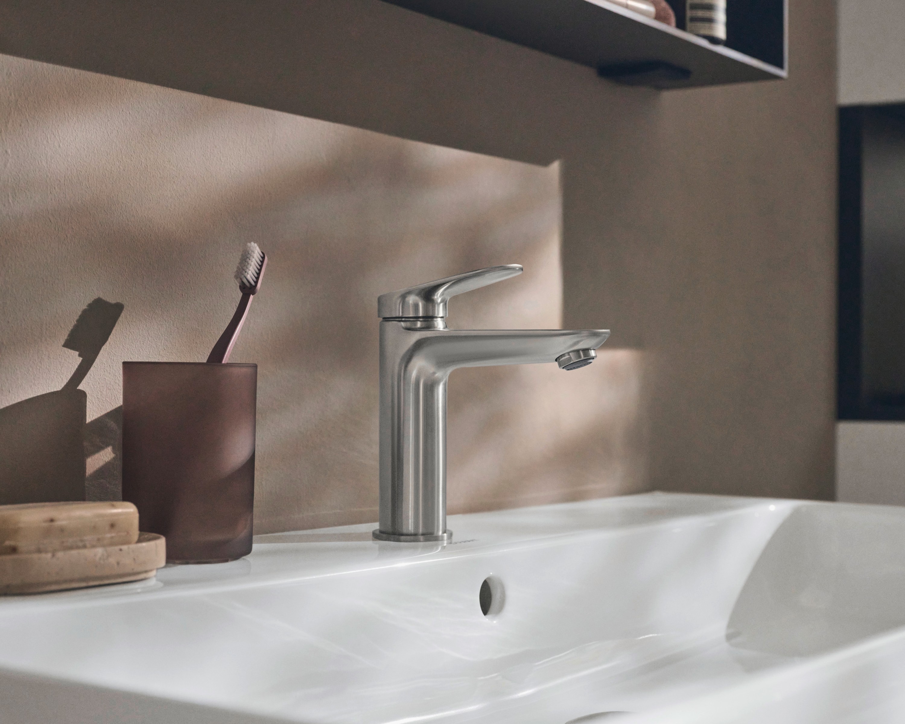 Collection One sink with a large basin and faucet