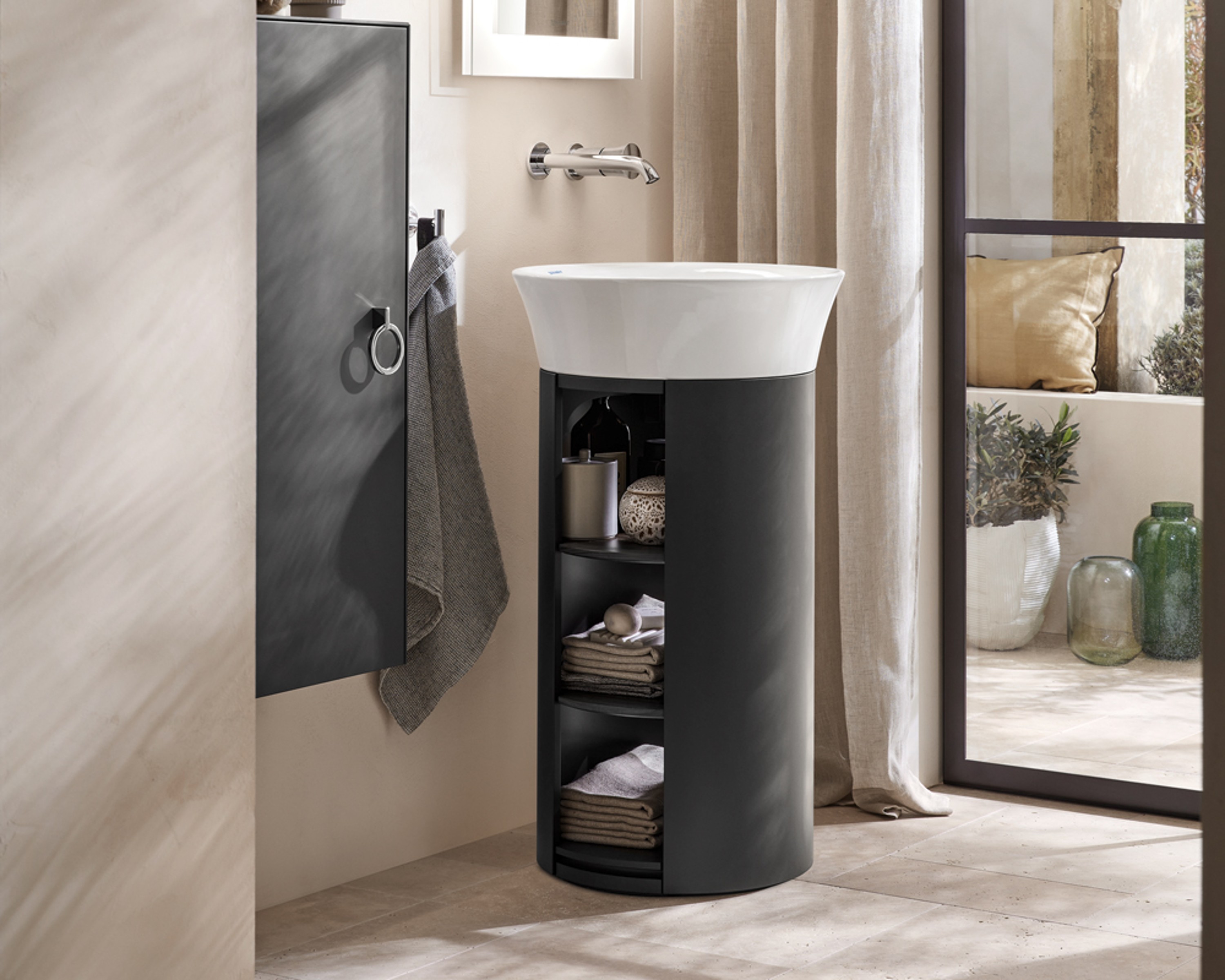 Round countertop sink with vanity unit