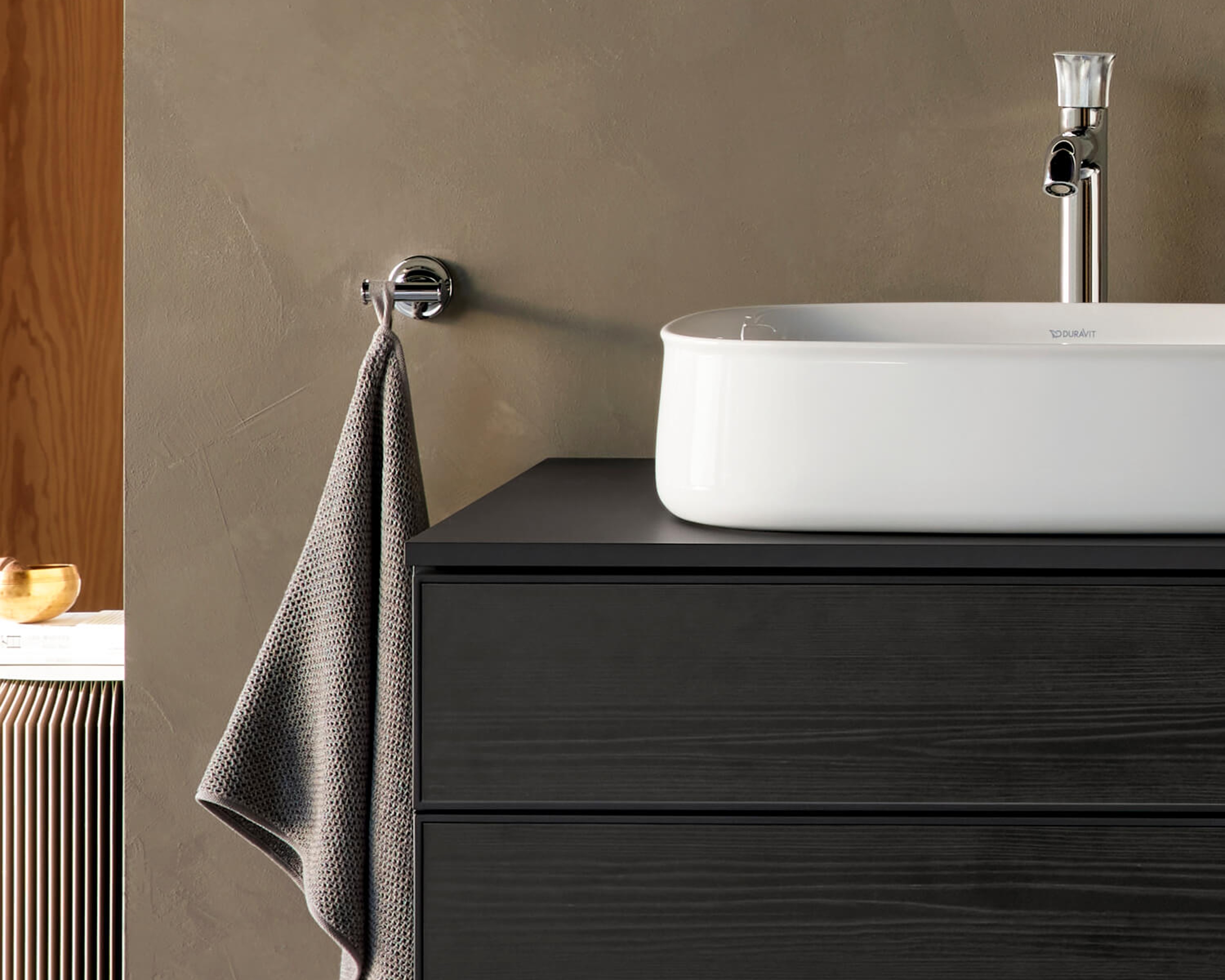 Starck T accessory next to Zencha countertop sink