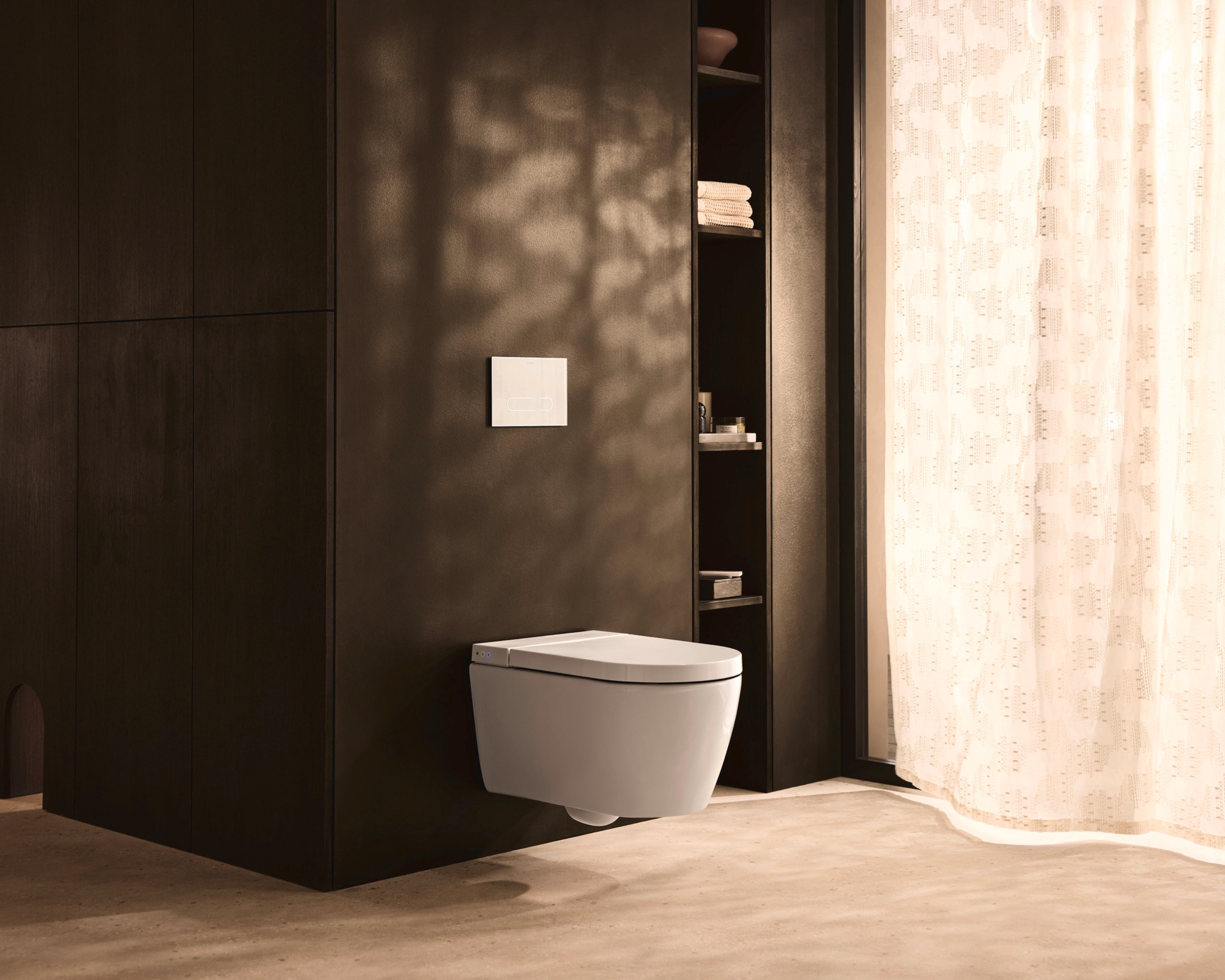 Wall-mounted shower toilet from the SensoWash Starck f series, side view