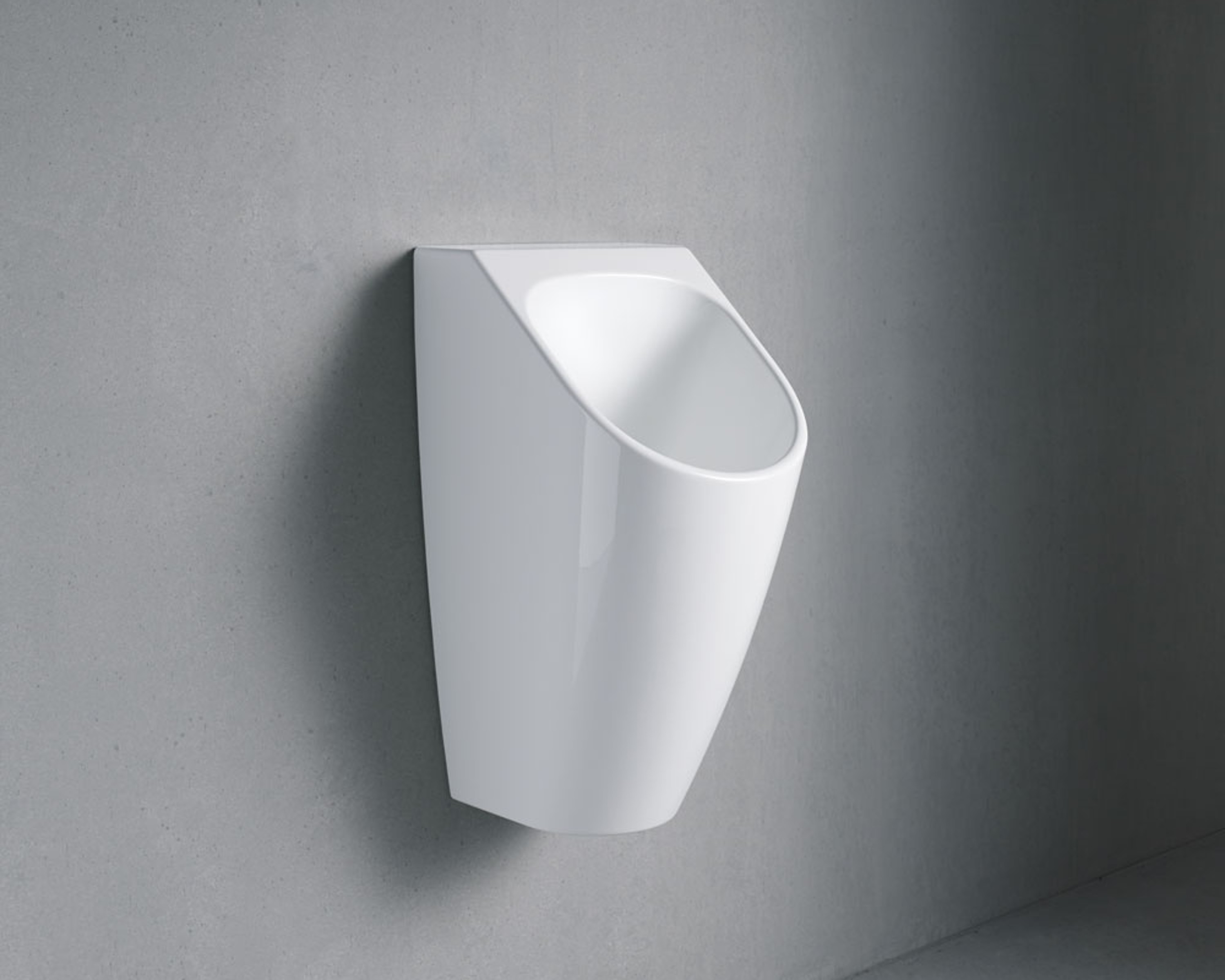 Urinal on concrete wall by Duravit
