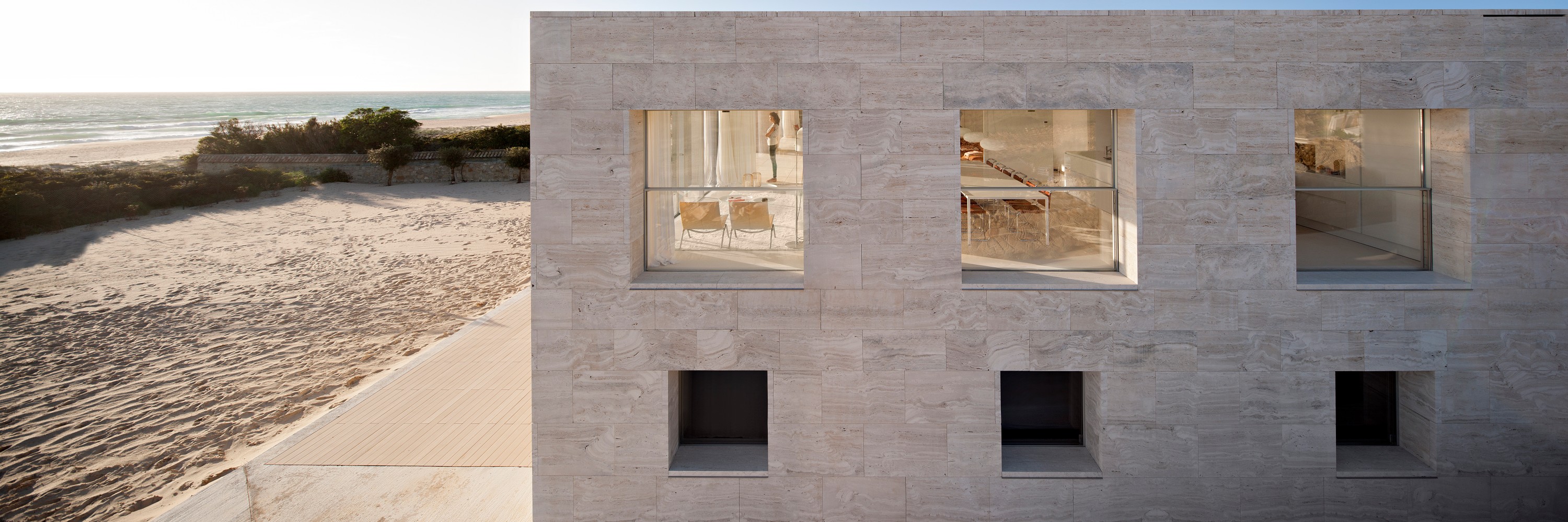 House of the Infinite, exterior view of the building with sea view on the left