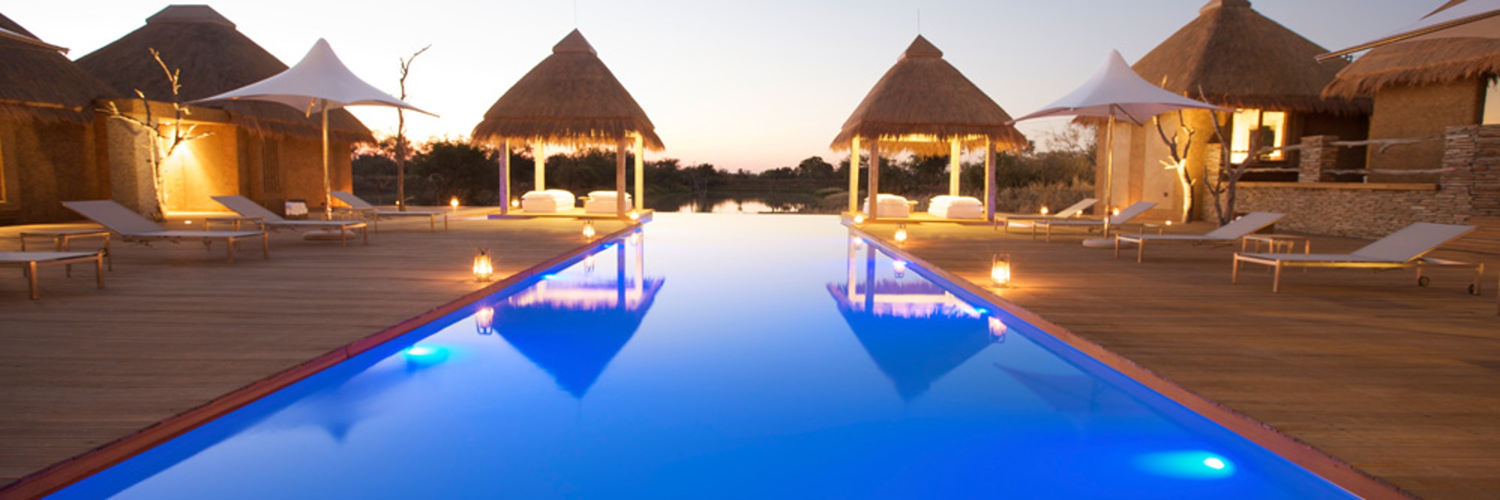 Kapama Karula Lodges, pool area with sun loungers