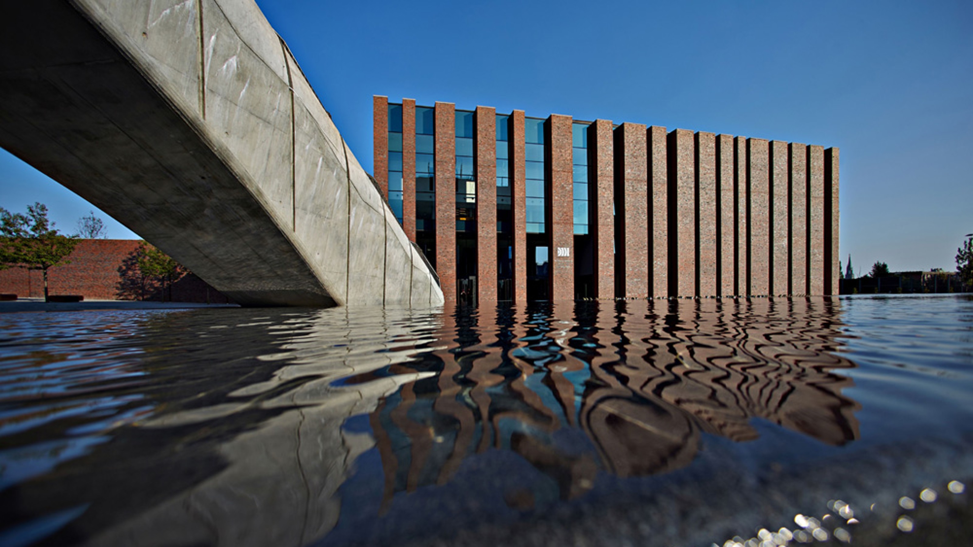 Katowice Concert Hall, exterior view of the building with water in the foreground