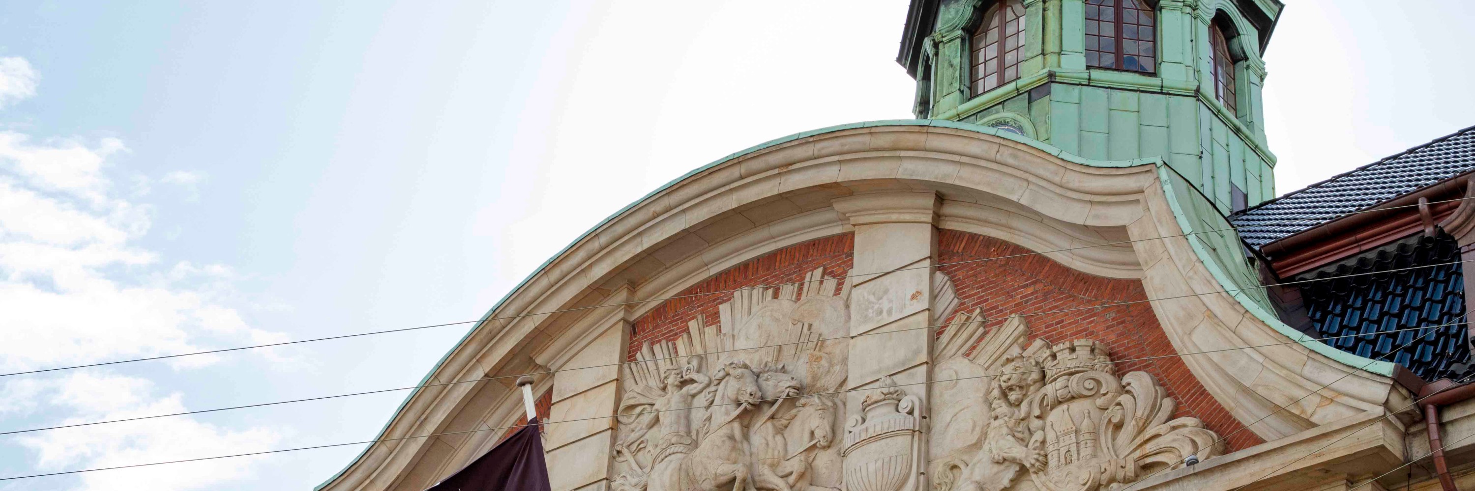 Villa Copenhagen, exterior view of the building with a flag flying