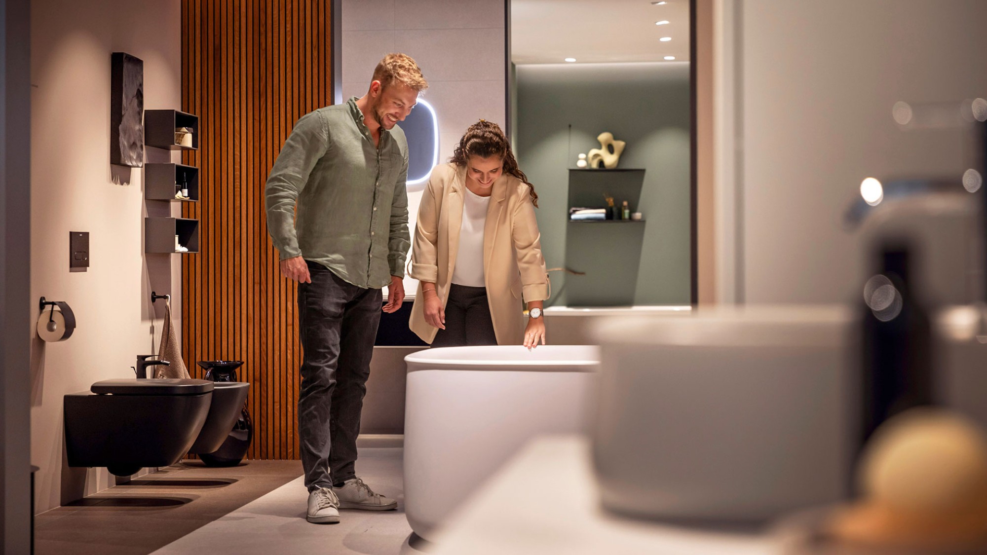 A couple looking at Duravit products